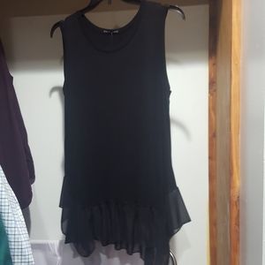 Black sleeveless top with ruffle bottom